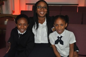Deidre Christopher-Garner with two of her children at PenTab, left to right, Ngozi, 8, a third-grader, and Naima, 6, a first-grader